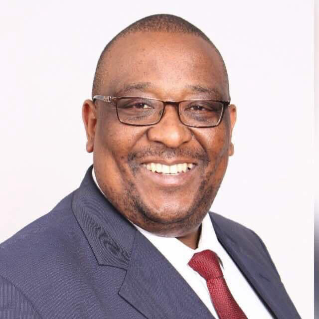 Dr Mike Juru